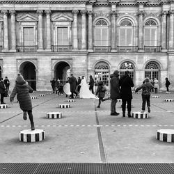 Group of people in front of building