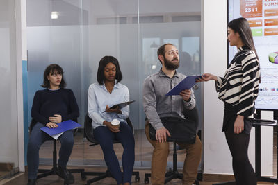 Group of business colleagues working in office