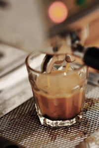 Close-up of coffee cup on table