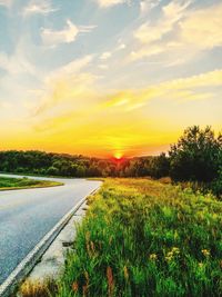 Scenic view of landscape against sky during sunset