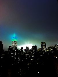 Illuminated cityscape at night