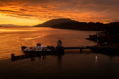 Ferryboat sunrise. aerial view of the lummi island ferry, the whatcom chief  during a  sunrise.