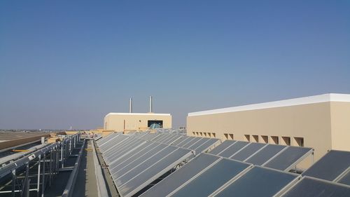 Low angle view of building against blue sky