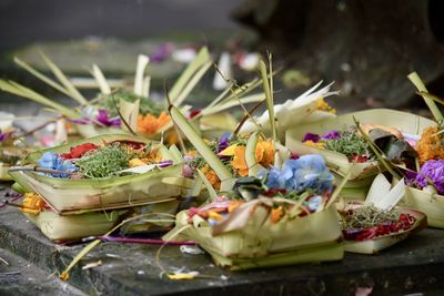 Close-up of vegetables and leaves on table