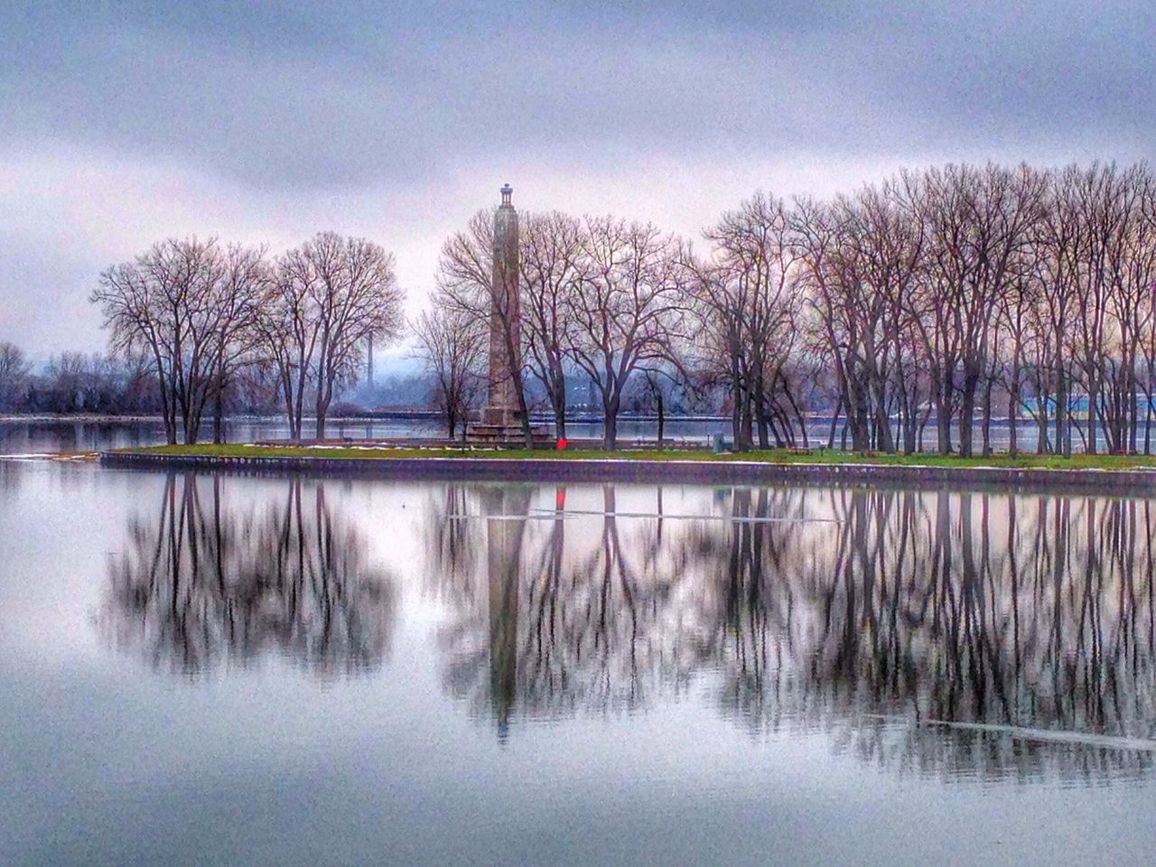 water, tree, bare tree, reflection, waterfront, river, lake, bridge - man made structure, connection, sky, built structure, tranquility, architecture, tranquil scene, nature, bridge, scenics, branch, beauty in nature, silhouette