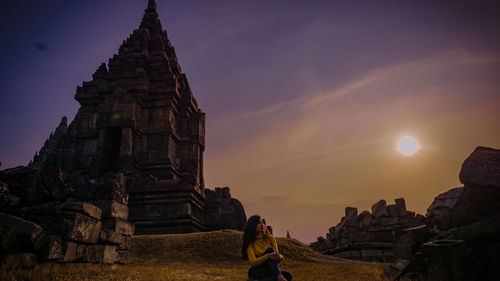 Panoramic view of historic building against sky during sunset