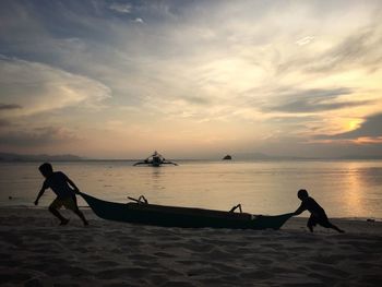 Scenic view of sea at sunset