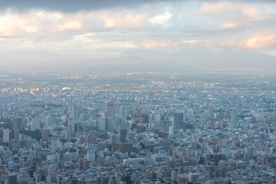 Aerial view of residential district against sky