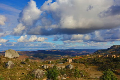 View of landscape against cloudy sky