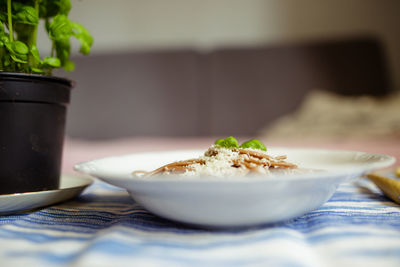 Close-up of bread in bowl on table