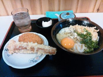 Close-up of served food on table