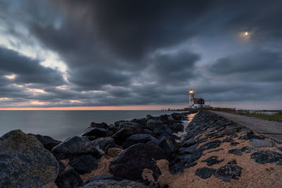 Scenic view of sea against sky at sunset