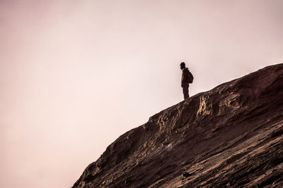 Silhouette of man on mountain