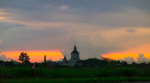 Scenic view of landscape against cloudy sky