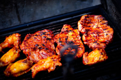Close-up of meat on barbecue grill
