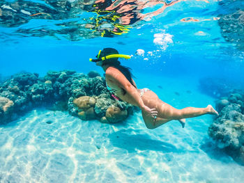 Man swimming in sea