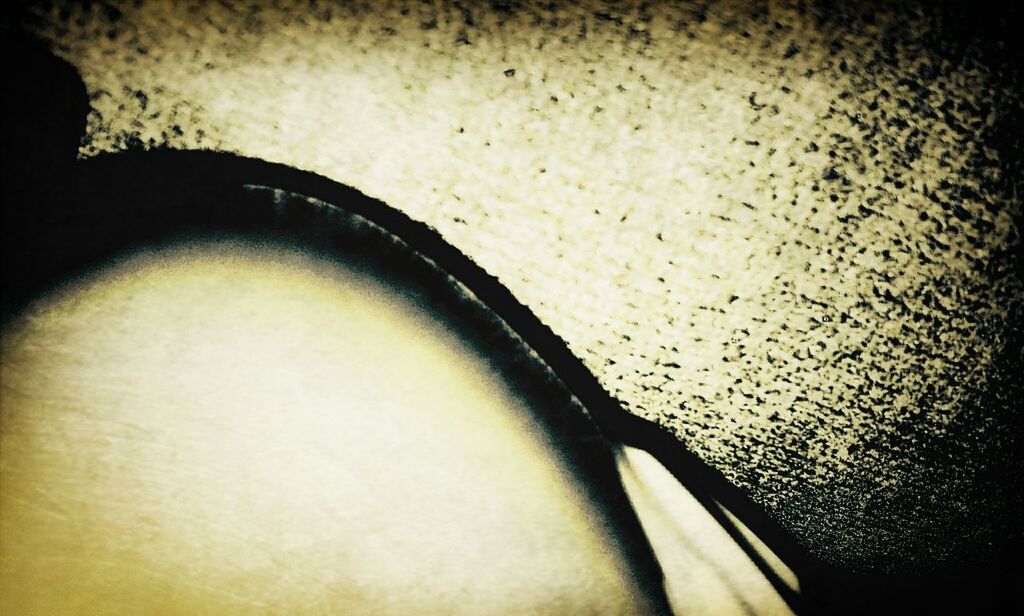 indoors, close-up, still life, part of, high angle view, table, no people, absence, single object, selective focus, copy space, detail, cropped, book, home interior, simplicity, empty, shadow, paper, reflection