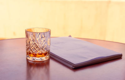 Close-up of glasses on table