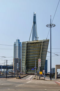 The iconic erasmus bridge, temporarily closed for traffic to enable the passage of a small yacht