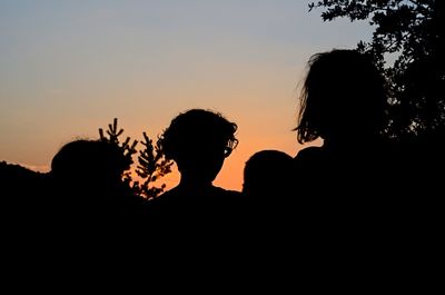 Silhouette of trees against sky at sunset