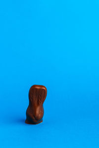 Close-up of toy against blue background