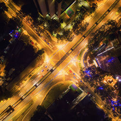 Aerial view of illuminated city street at night