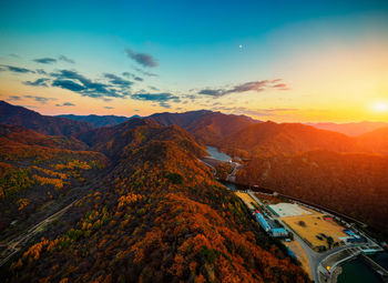 Scenic view of mountains against sky during sunset