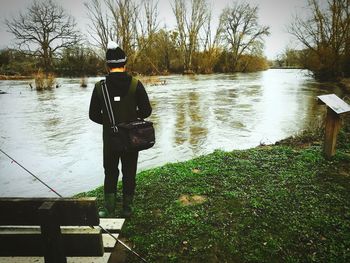 Rear view of man in water