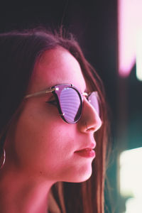 Close-up of woman wearing sunglasses