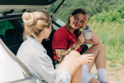 Portrait of woman using mobile phone