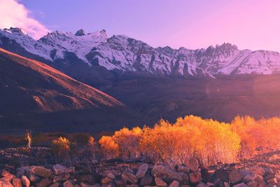 Scenic view of snowcapped mountains against sky during winter