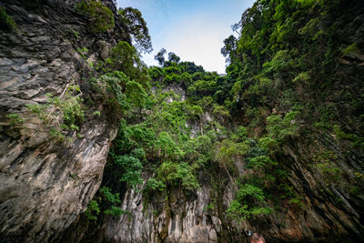 Low angle view of rocks against sky