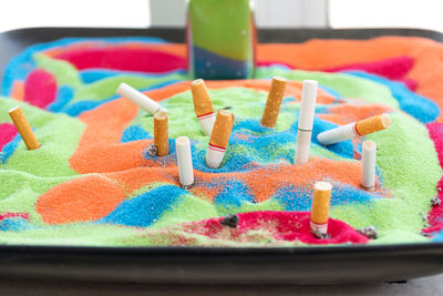 Close-up of multi colored candies on table