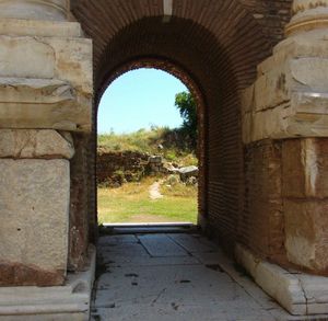 Archway leading to stone wall