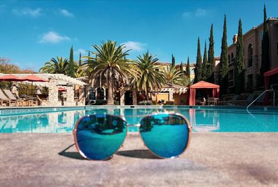 View of swimming pool against blue sky