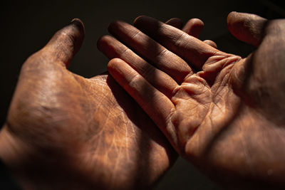 Close-up of man hand dirty