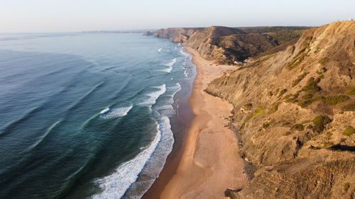 Scenic view of beach against sky