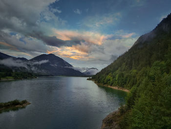 Scenic view of lake against sky during sunset