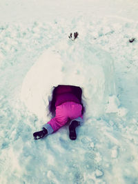 High angle view of woman in snow