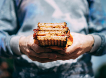 Close-up of man holding food