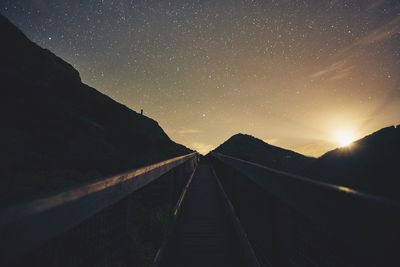 Illuminated road at night