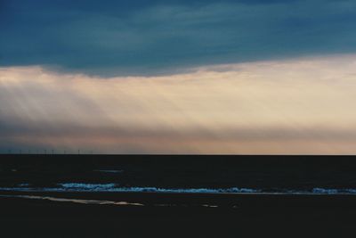 Scenic view of calm sea at dusk