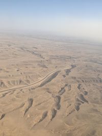 High angle view of desert land against clear sky