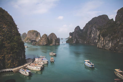 Boats moored in sea