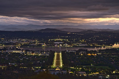 High angle view of buildings in city during sunset