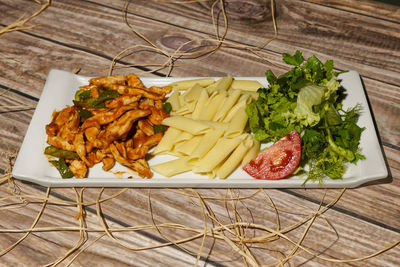 High angle view of food served on table