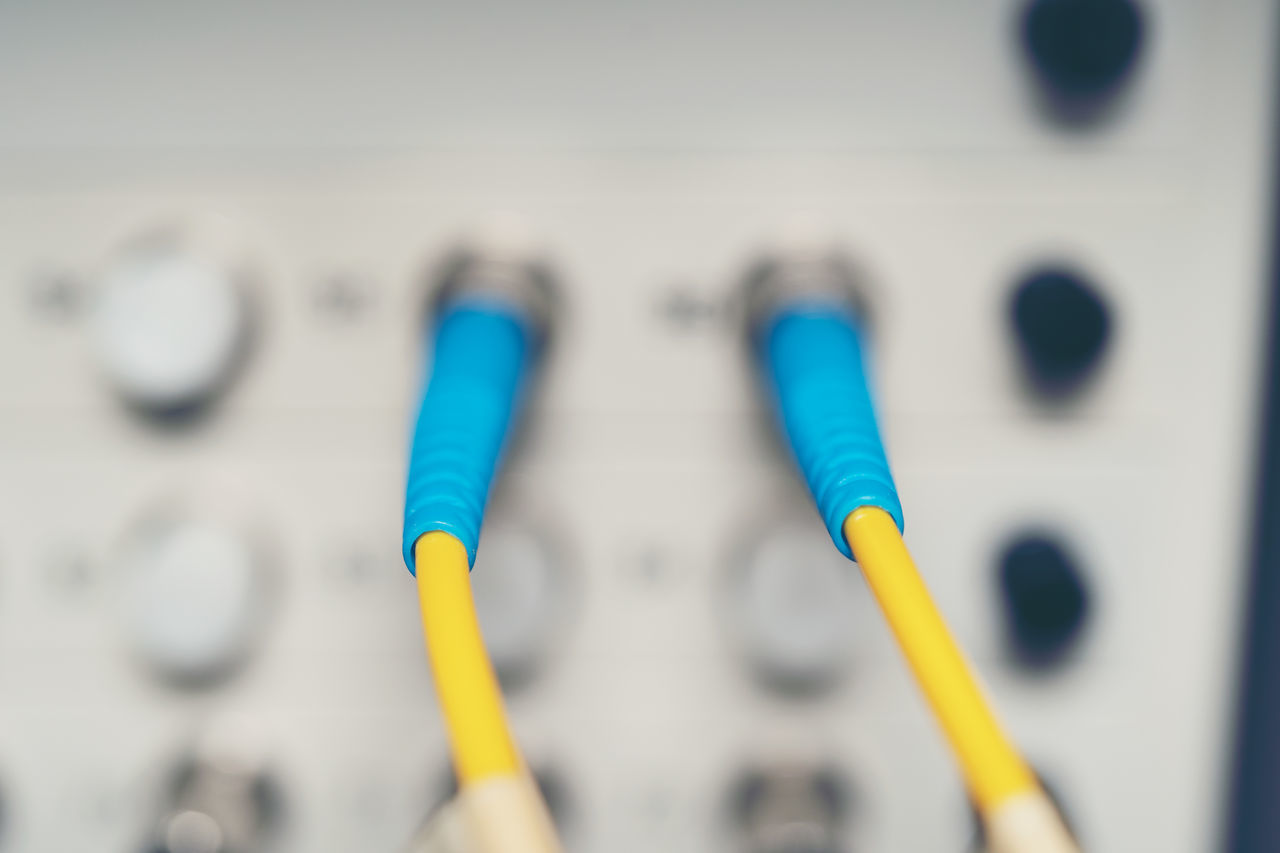 CLOSE-UP OF YELLOW COMPUTER KEYBOARD