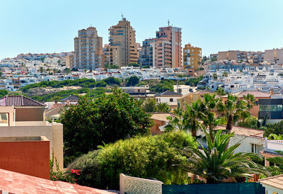 View of cityscape against clear sky