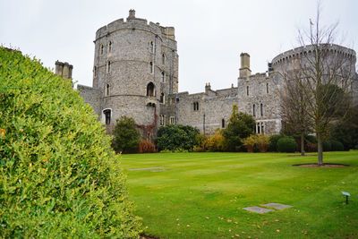 View of castle against built structure