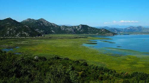 Scenic view of lake and mountains